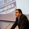 A profile photograph of Journalism Studies graduate Daniel Sheridan giving a talk.