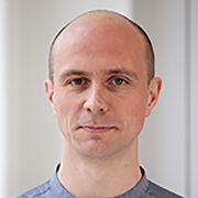 A headshot of Dr Dar Olner
