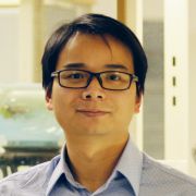 A portrait of Dr Dikai Guan