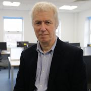 A profile photograph of Mark Hanna.