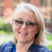 Nicola Talbot stood outside Firth Court wearing a blue blazer