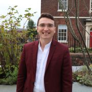 Joshua Forstenzer stood outside HRI building