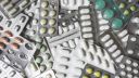 Lots of medication, pills and lozenges, in a pile - image 