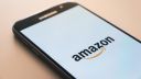 Smartphone displaying Amazon logo 