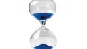 A picture of an hourglass with blue sand