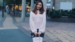 Student holding bag