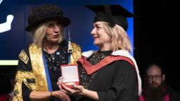 Chancellor Lady Justice Rafferty presenting Lucie Cave with her award