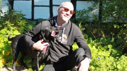PhD student Stephen Langford with his dog