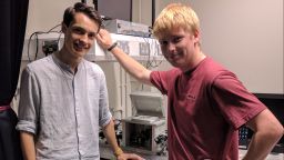 John Cully and James Baxter with the single molecule FRET microscope they built for their masters project.