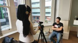 Students operating camera