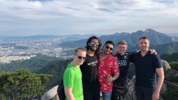 Daniel at the top of a mountain