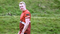 A photo of Sion in sports wear.