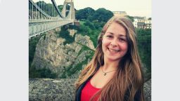 Meg stood by Clifton suspension bridge.