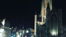 A church and city scene at night