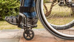 A photo of shoes in a wheelchair