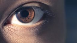 A close up of a person with brown eyes