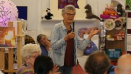 A woman speaking at the Imagine north east exhibition launch
