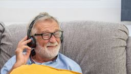 Man Listening to music with headphones