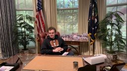 Image of IR & Politics student Peter Bland Reclining at the desk in the Oval Office, Washington DC