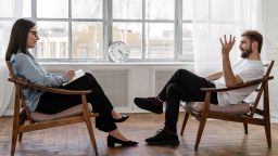 Man talking to therapist