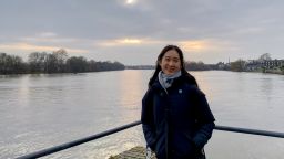 A woman stood in front of a river