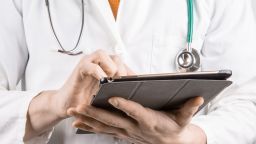 Doctor holding a tablet computer