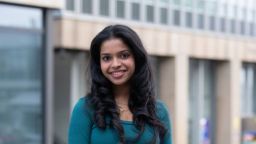 A south asian woman with long dark hair