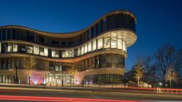 An image of The Wave building at night.