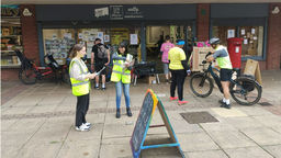 The urban room, Live Works, showing students interacting with the public in the forecourt outside the Urban Room