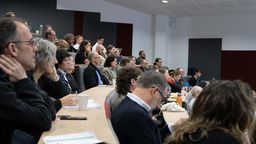 Lecture theatre full of engaged attendees
