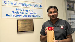 Professor David Sanders from Sheffield Gastroenterology holding an award
